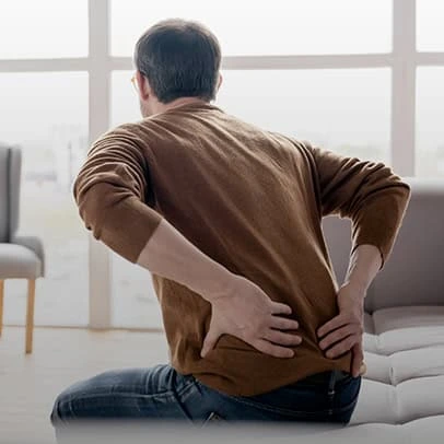 Man sitting up hold lower back