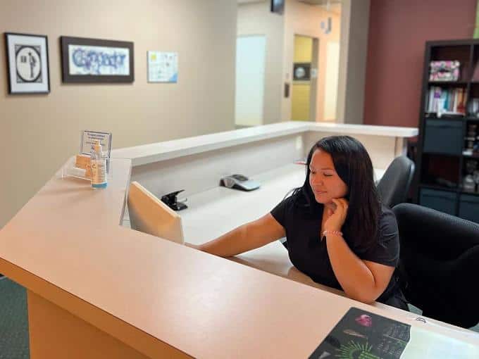 front desk clerk at health and rehab chiropractic
